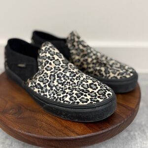 Vans Leopard Print Slip-On Sneakers in Black and Cream